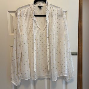 Ann Taylor crème and gold blouse. Ruffle neck with tie. Size XL